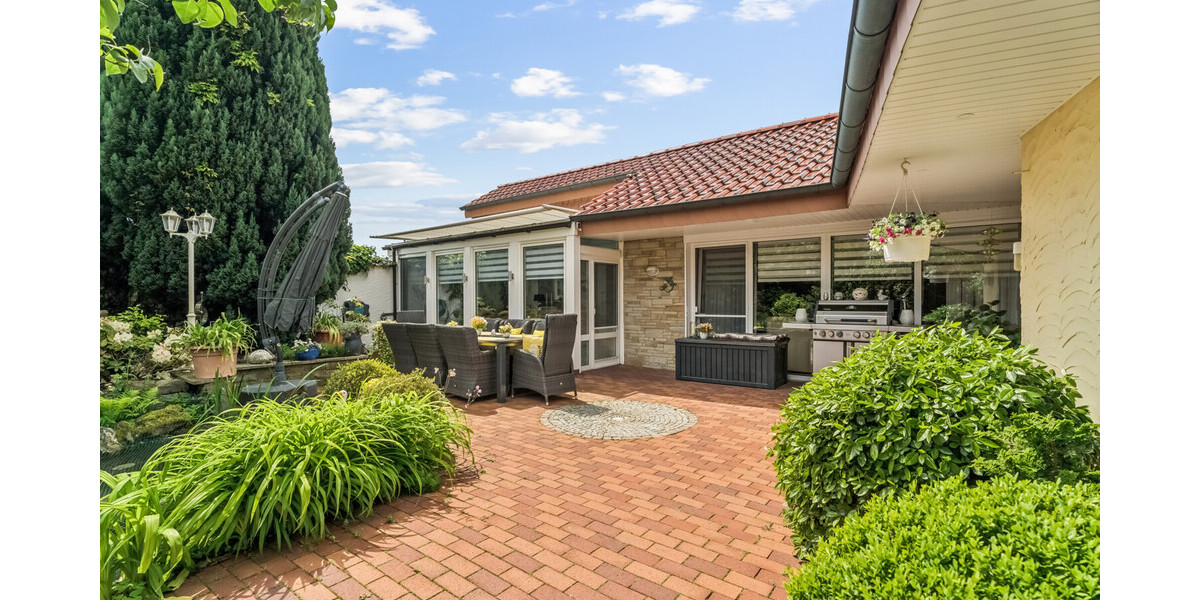Stilvoller Bungalow mit Wintergarten & Kamin – Wohnen auf einer Ebene in idyllischer Lage - Einfamilienhaus Rheine / Elte Rheine | Angebot:26781763